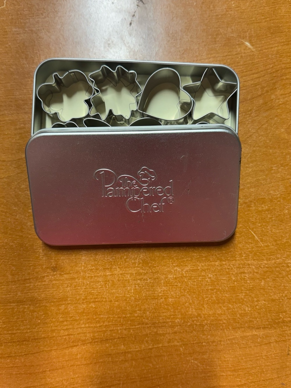 The Pampered Chef Silver Metal Cookie Cutter Tin Set